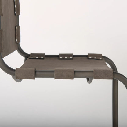 Berbick Dining Chair by Mercana. Made from leather, iron in a unique style.