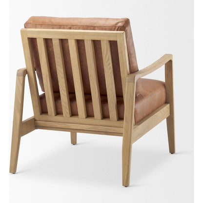 Raeleigh Leather Accent Chair by Mercana in tan. Made from fabric in a traditional style.