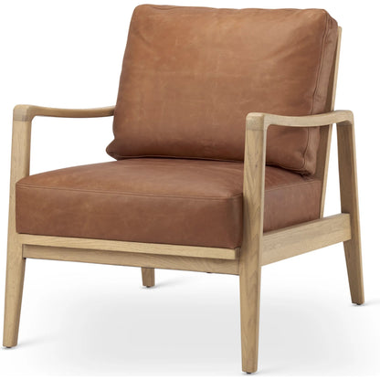 Raeleigh Leather Accent Chair by Mercana in tan. Made from fabric in a traditional style.