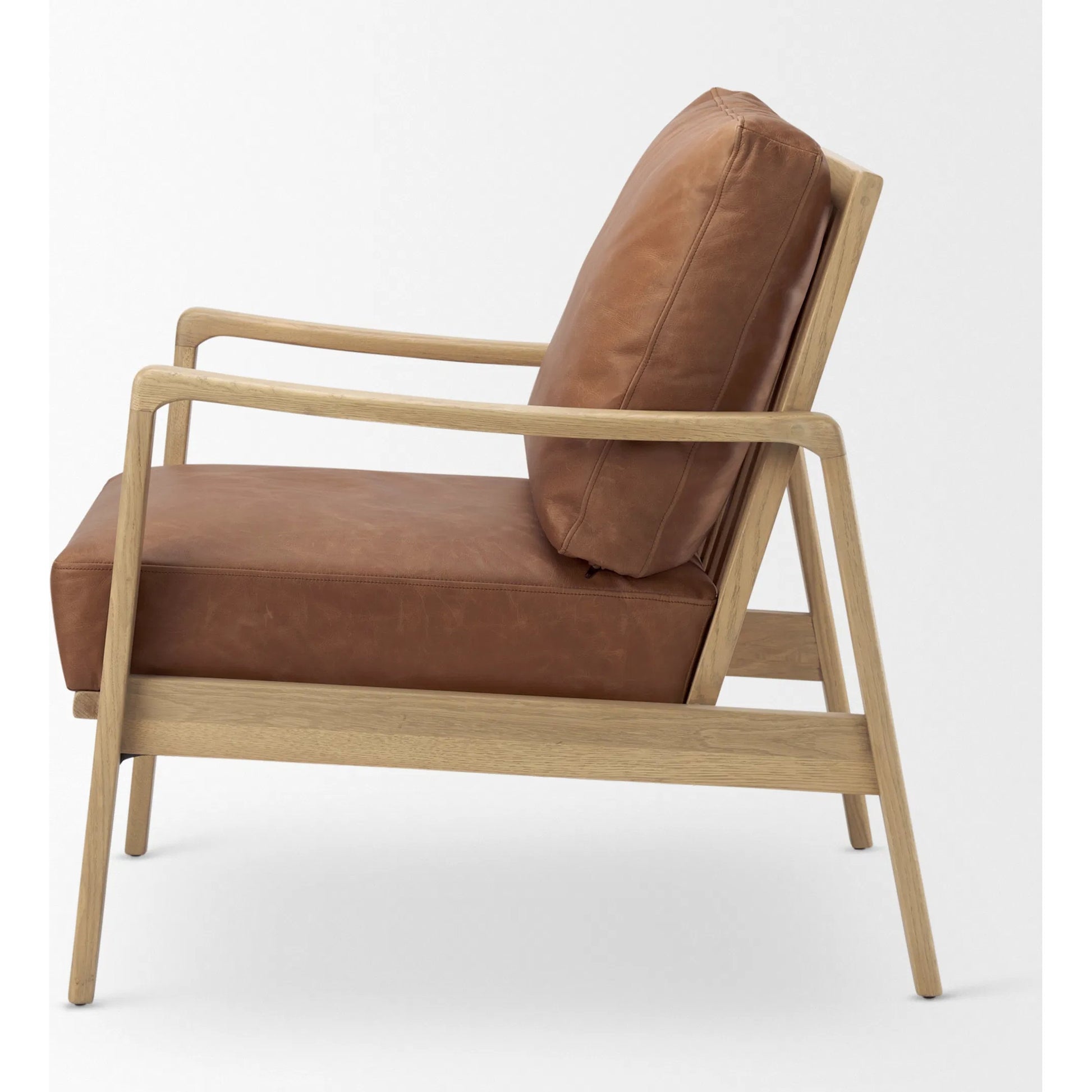 Raeleigh Leather Accent Chair by Mercana in tan. Made from fabric in a traditional style.