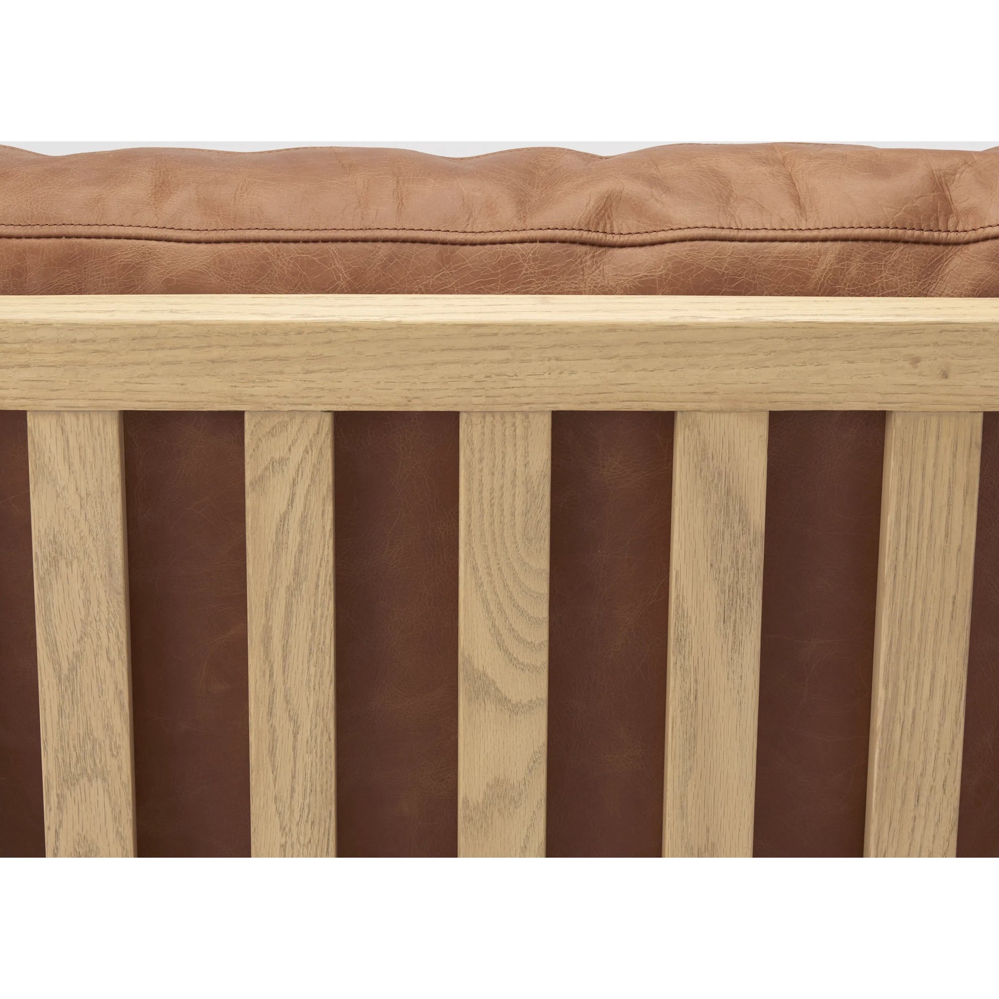 Raeleigh Leather Accent Chair by Mercana in tan. Made from fabric in a traditional style.