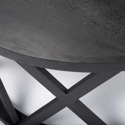 Forsey Round Coffee Table by Mercana in black. Made from solid wood in a transitional style.
