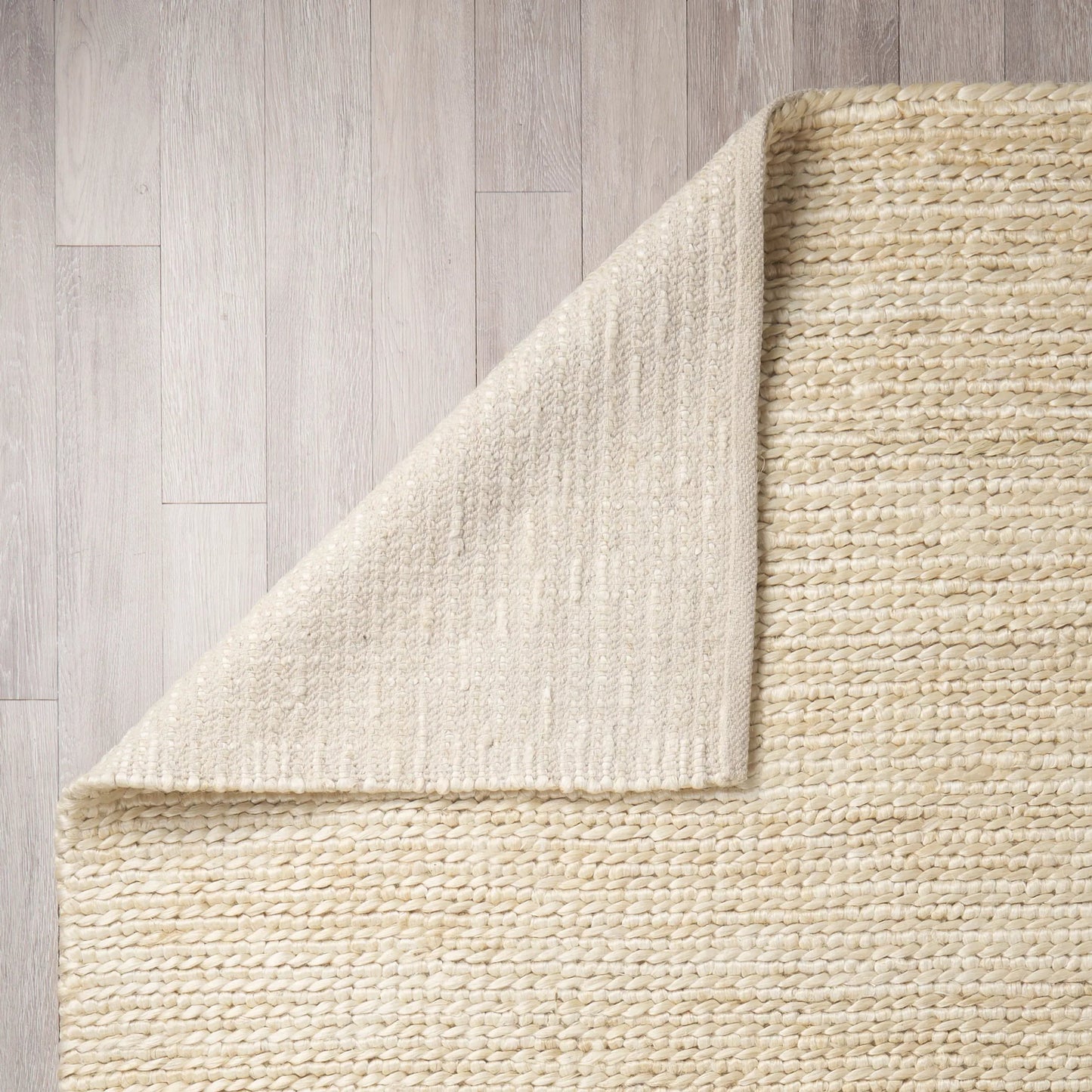 002 SI-2369752 | Closeup | Milo Rug by Mercana in beige. Made from fabric in a unique style.