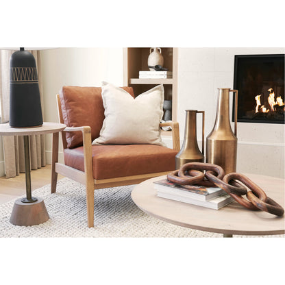 Raeleigh Leather Accent Chair by Mercana in tan. Made from fabric in a traditional style.