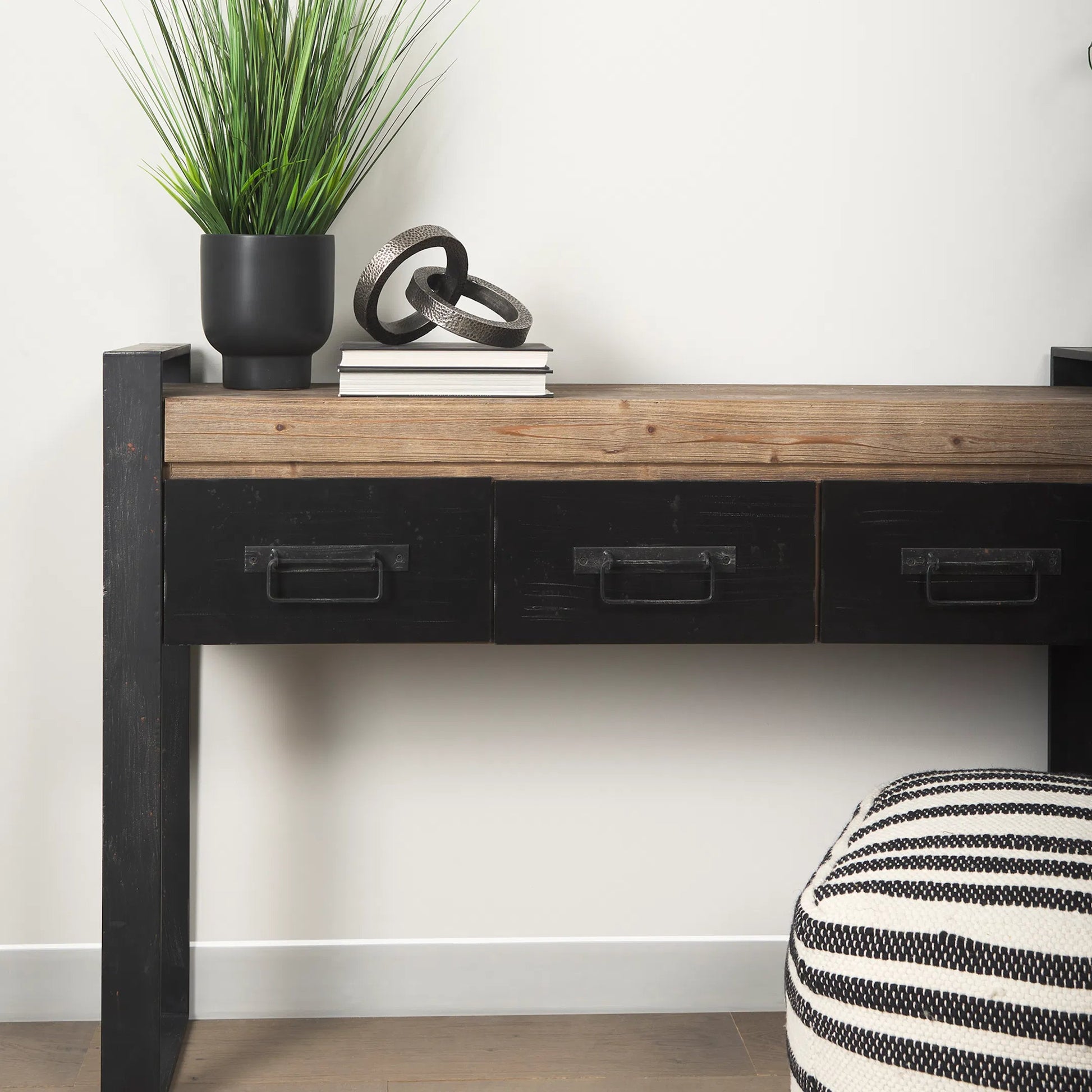 Carga Console Table by Mercana in black, natural. Made from unique in a modern style.