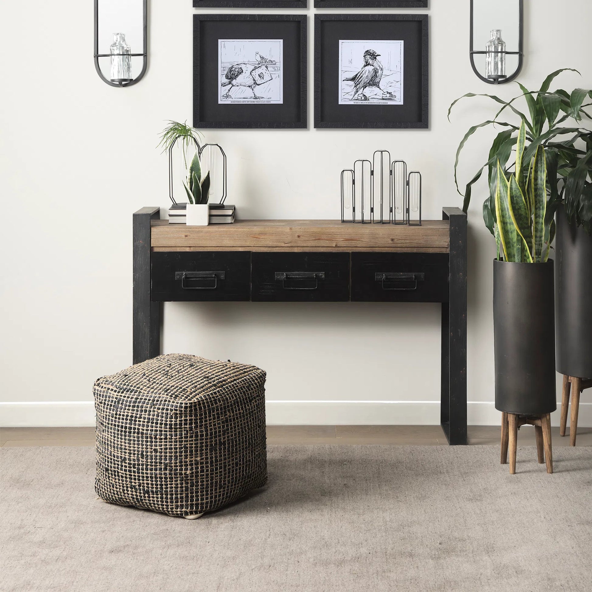 Aalia Pouf by Mercana. Made from leather in a rustic style.
