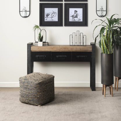 Aalia Pouf by Mercana. Made from leather in a rustic style.