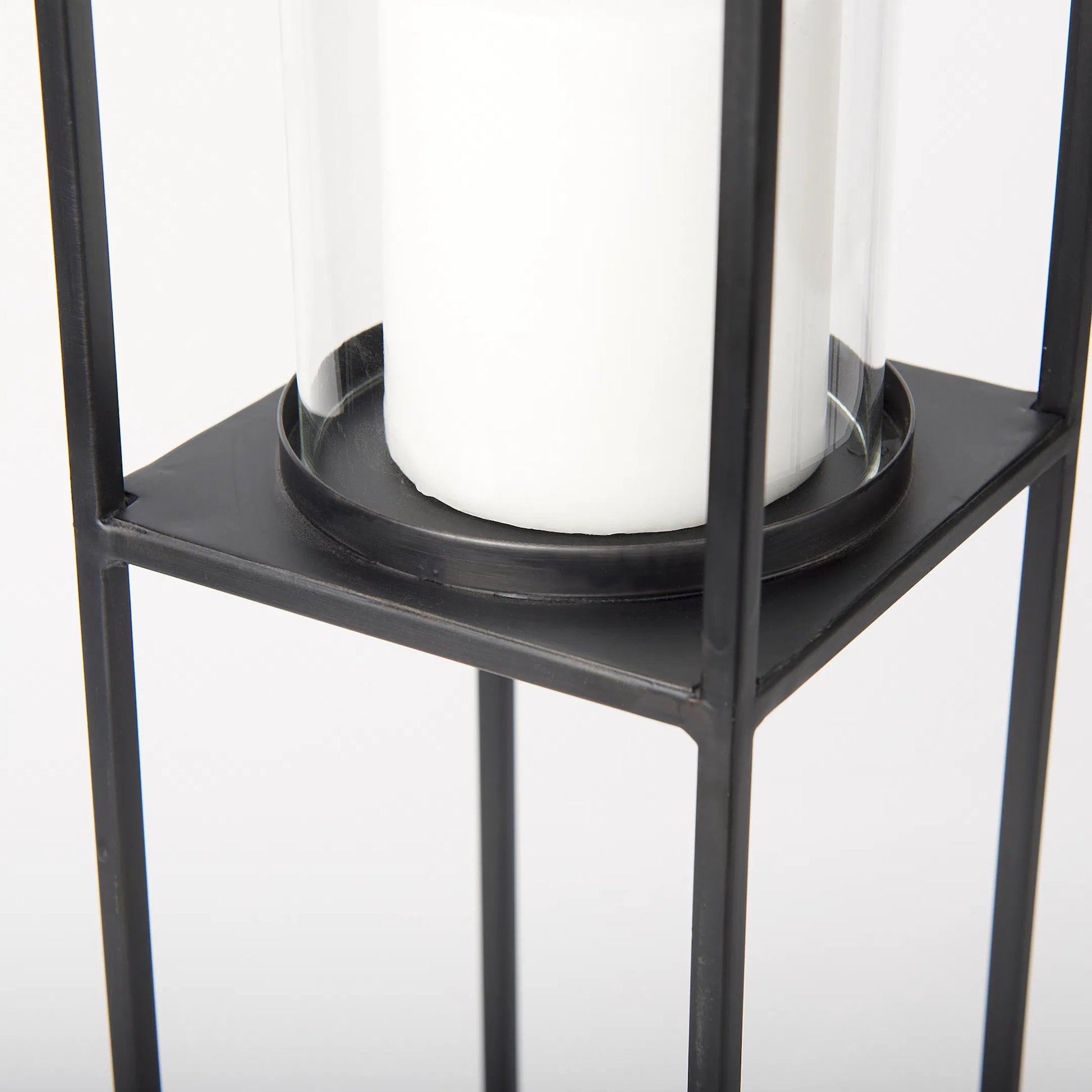 Cindy Candle Holders by Mercana in black. Made from metal in a transitional style.