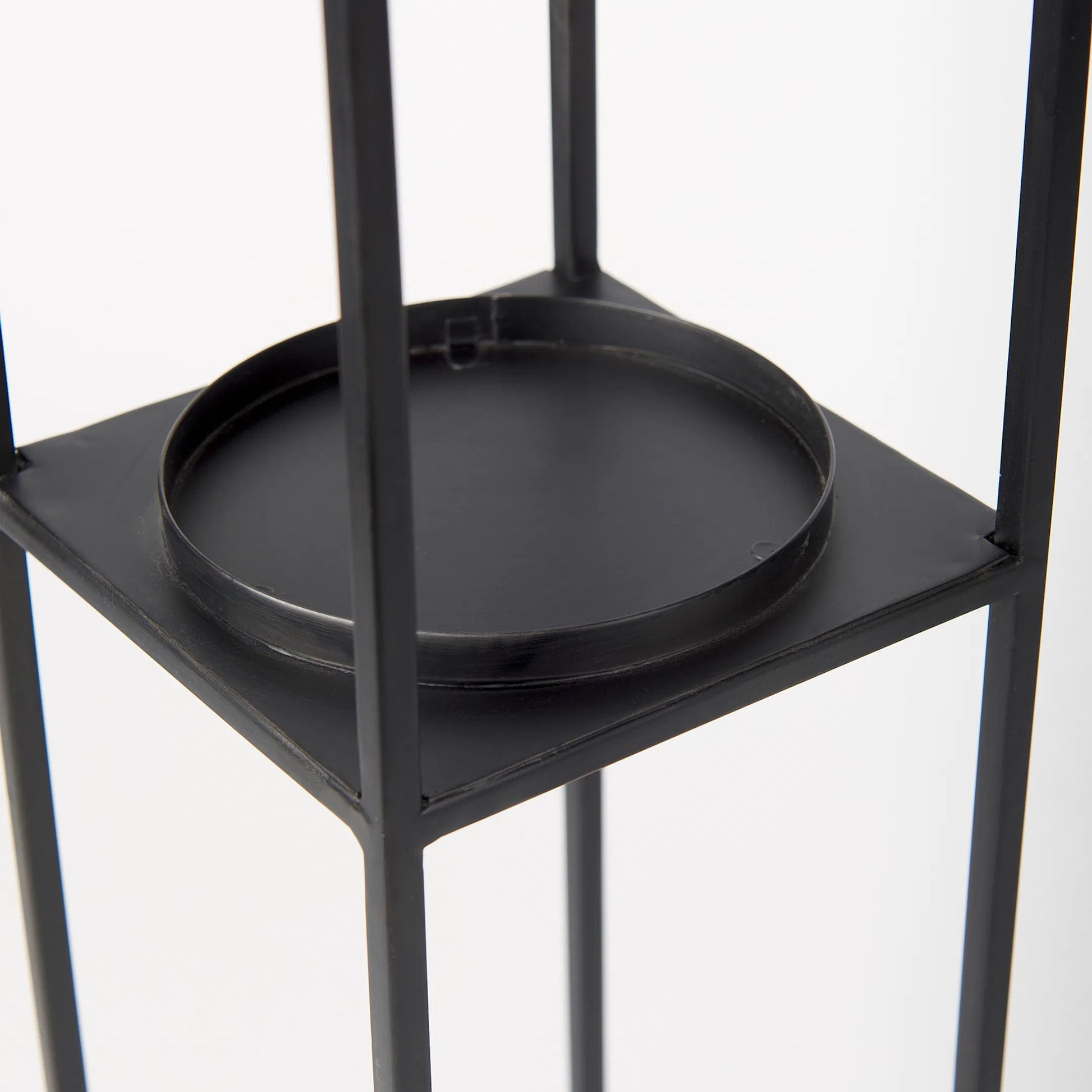 Cindy Candle Holders by Mercana in black. Made from metal in a transitional style.