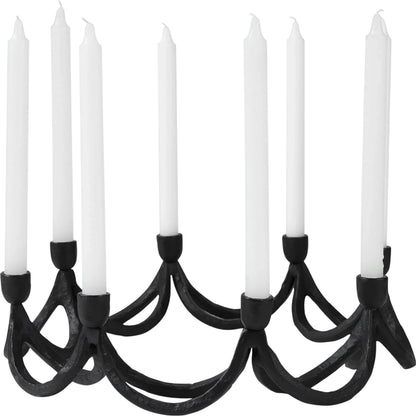 Seraph Candle Holder by Mercana in black. Made from metal in a traditional style.