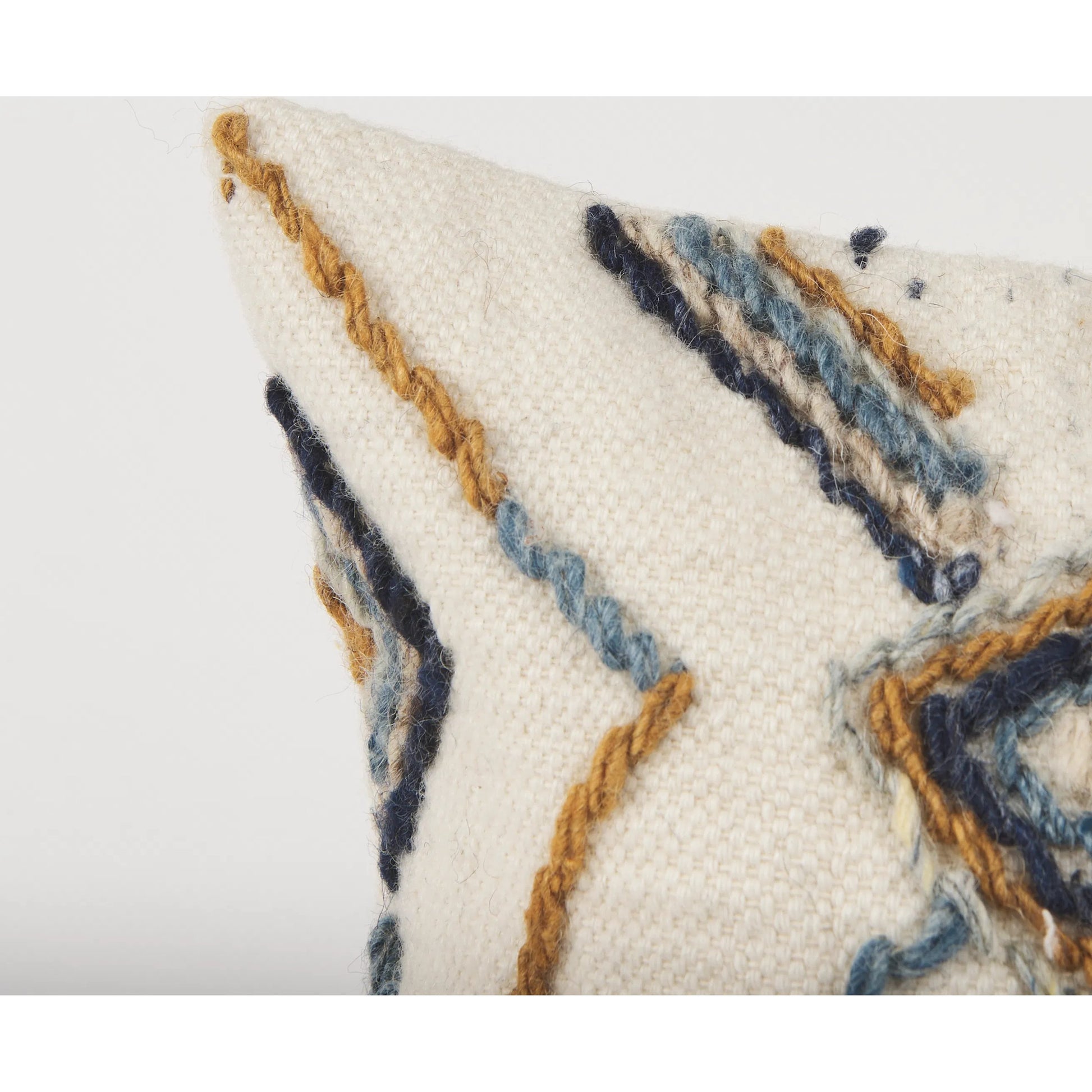 Kitt Lumbar Pillow Cover by Mercana in black, blue, yellow. Made from cotton blend in a rustic style.