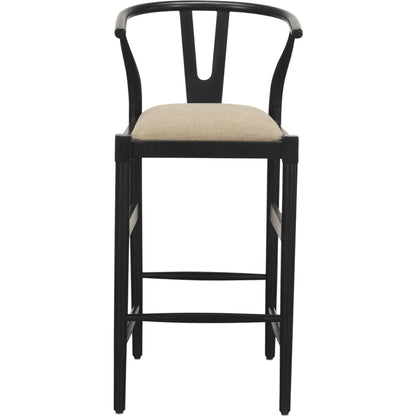 Trixie Upholstered Seat Bar Stool by Mercana in black. Made from solid wood in a unique style.