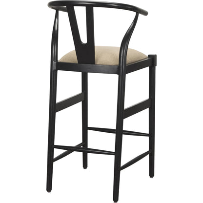 Trixie Upholstered Seat Bar Stool by Mercana in black. Made from solid wood in a unique style.