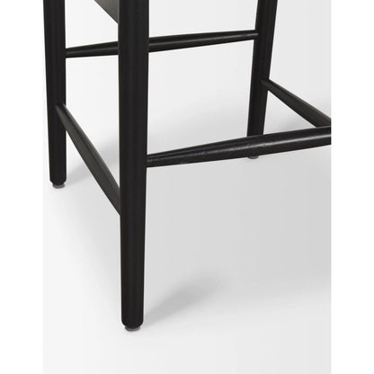 Trixie Upholstered Seat Bar Stool by Mercana in black. Made from solid wood in a unique style.