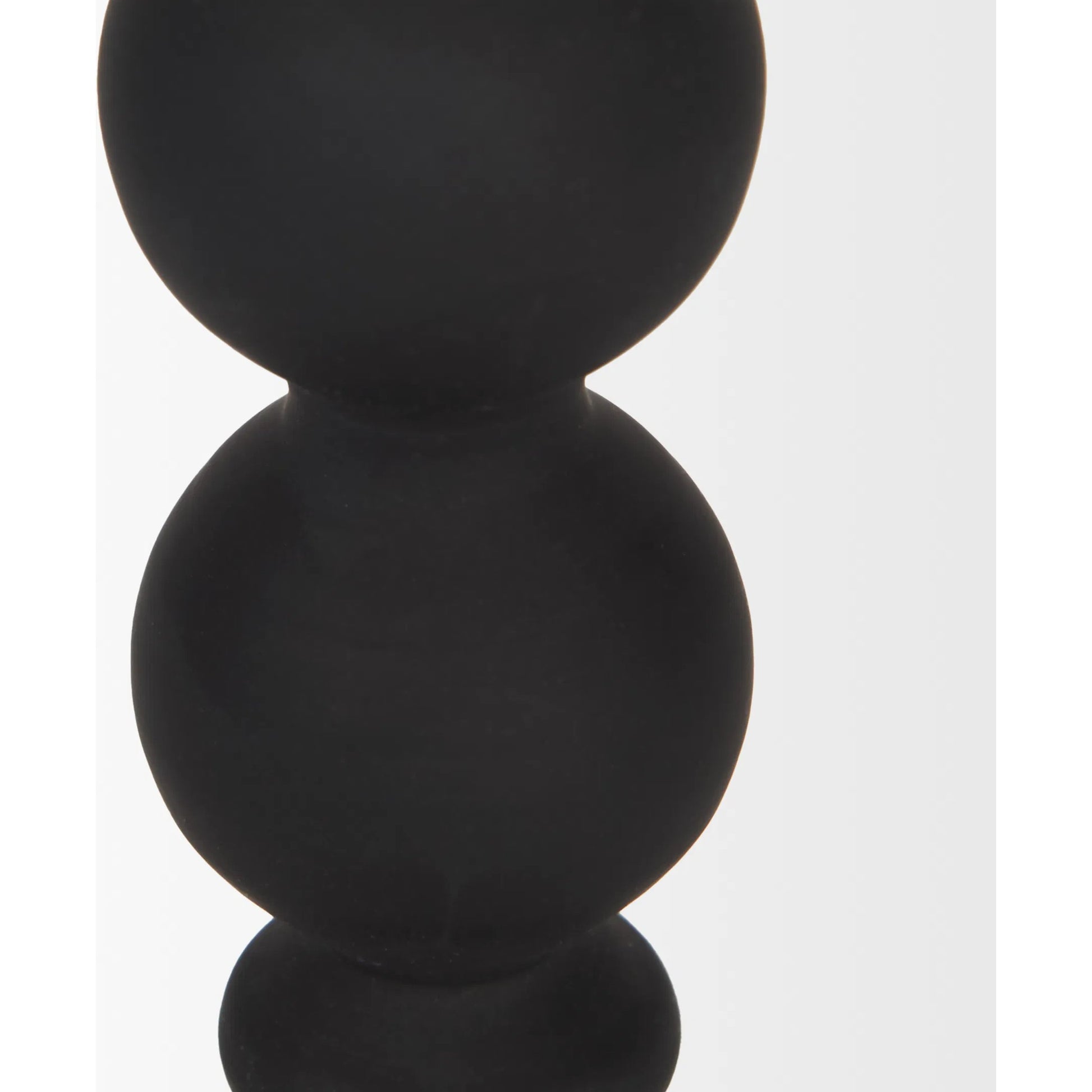 Haute Matte Black Blown Glass Candlestick by Mercana in black. Made from metal in a traditional style.