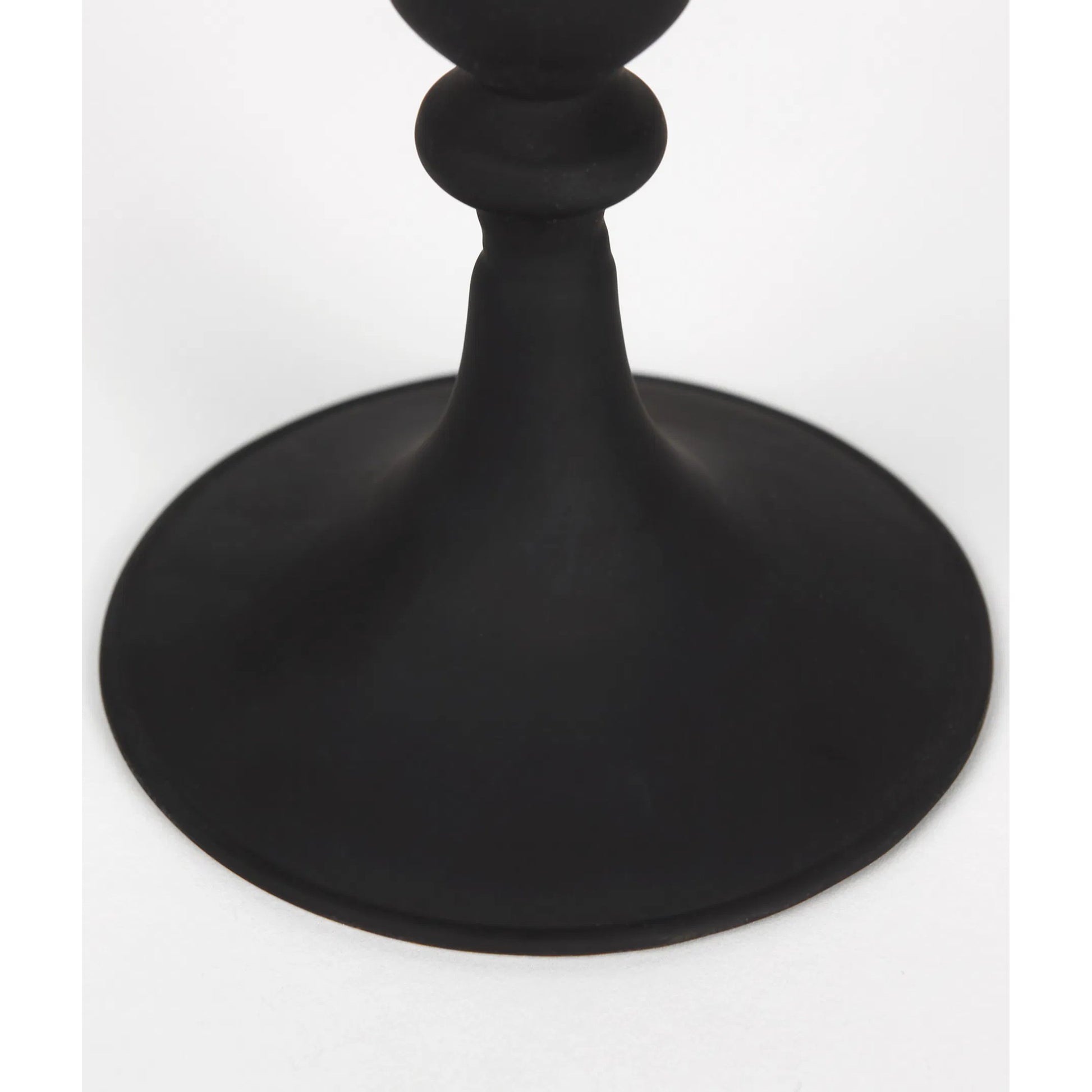 Haute Matte Black Blown Glass Candlestick by Mercana in black. Made from metal in a traditional style.