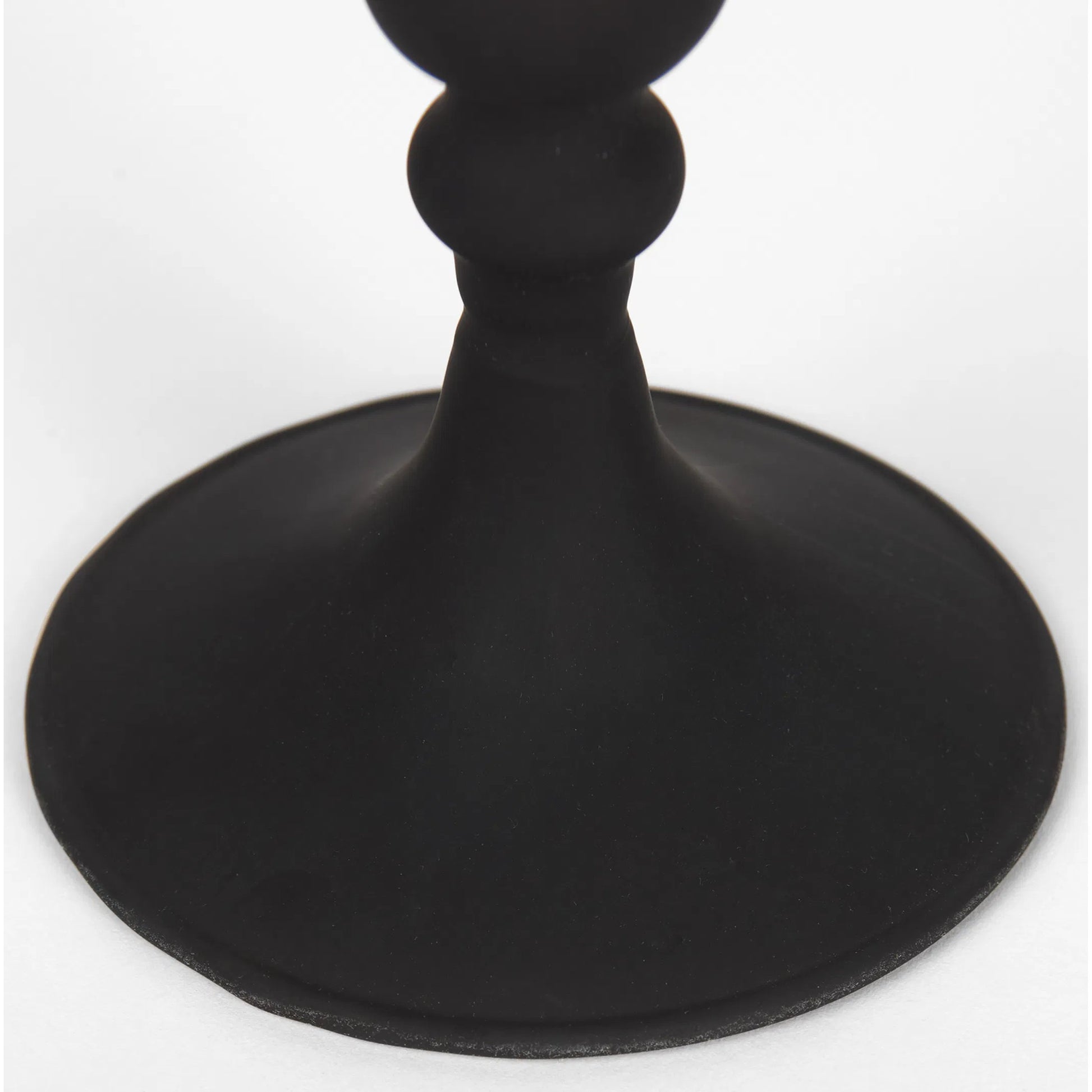 Haute Matte Black Blown Glass Candlestick by Mercana in black. Made from metal in a traditional style.