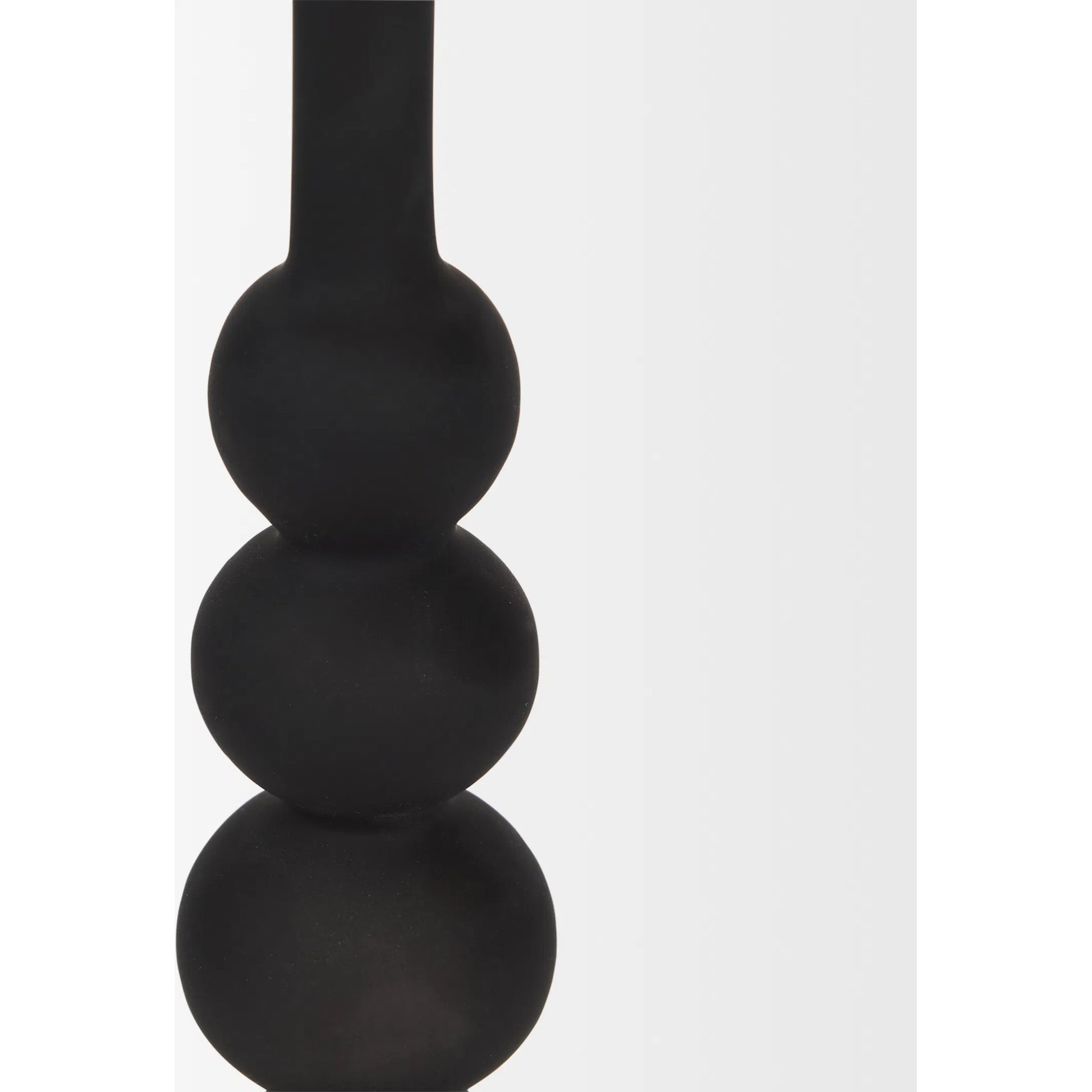 Haute Matte Black Blown Glass Candlestick by Mercana in black. Made from metal in a traditional style.