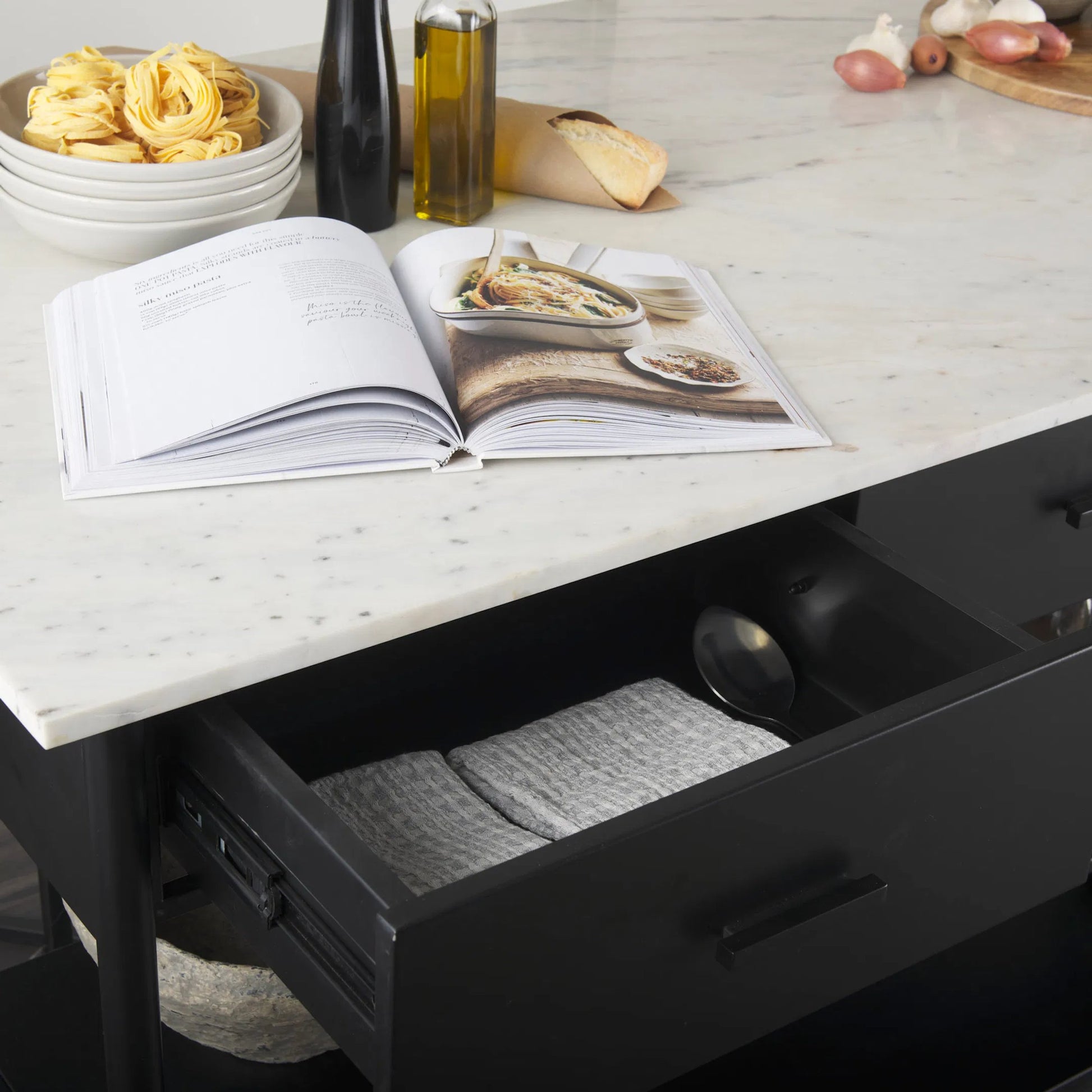 Amika Kitchen Island by Mercana in white, black. Made from iron in a unique style.