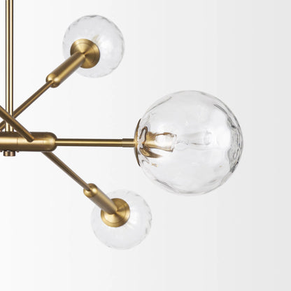Britton Chandelier by Mercana in gold. Made from glass, metal in a modern style.