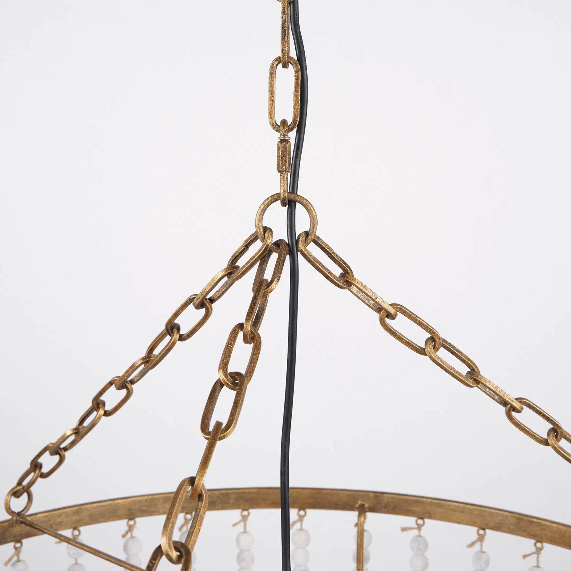 Rhone Chandelier by Mercana in gold. Made from metal, wood in a traditional style.