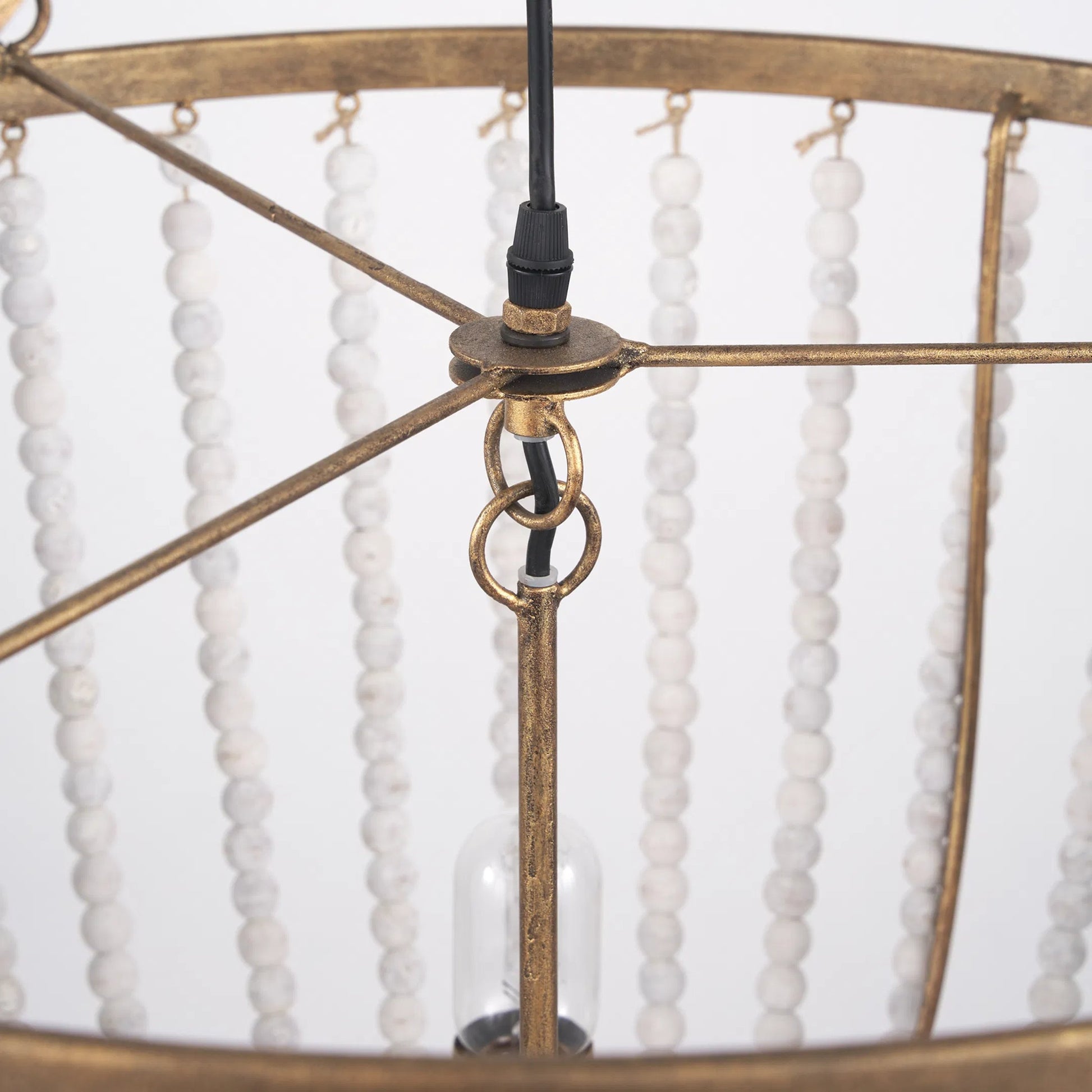 Rhone Chandelier by Mercana in gold. Made from metal, wood in a traditional style.