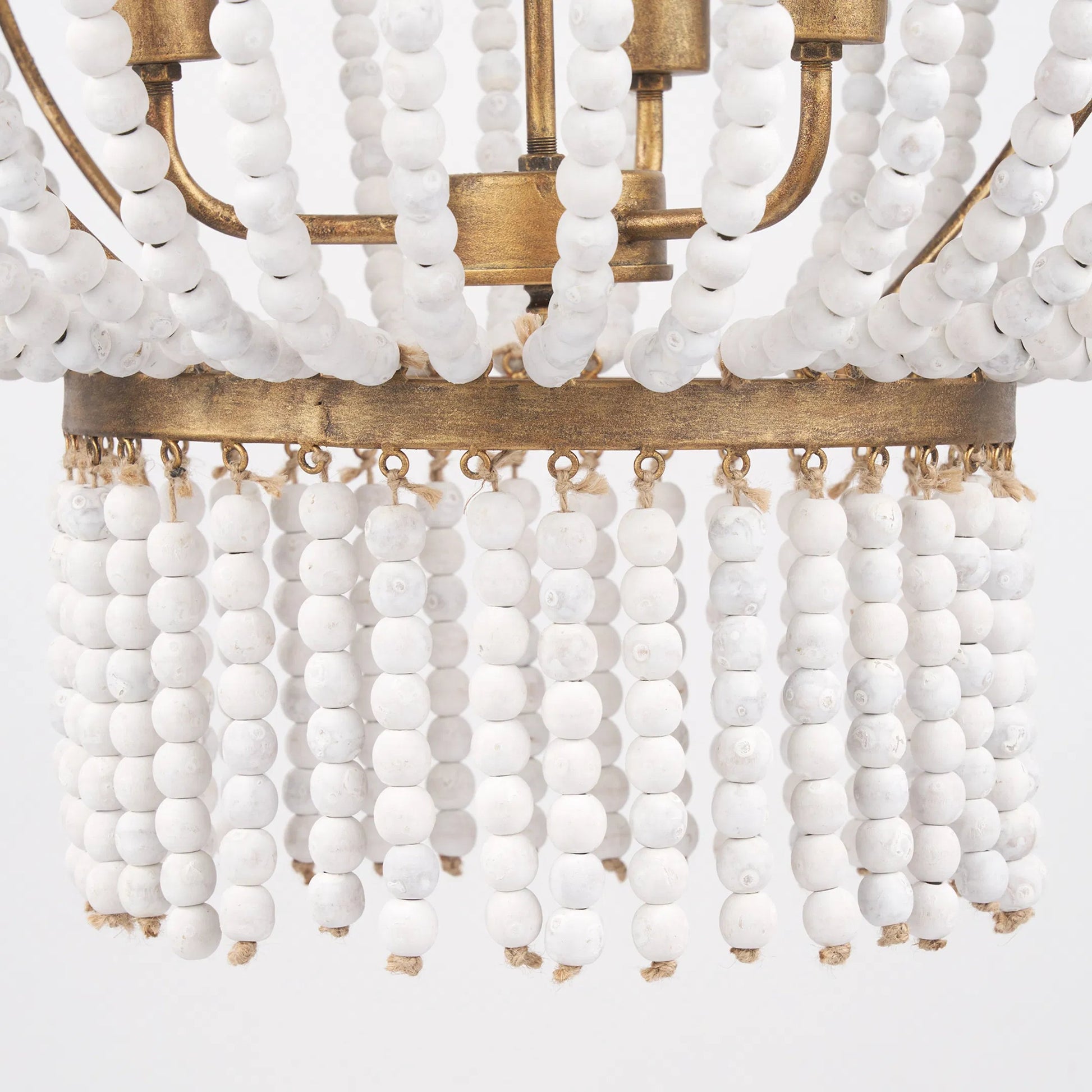 Rhone Chandelier by Mercana in gold. Made from metal, wood in a traditional style.