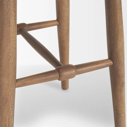 Ernest Bar Stool by Mercana in brown. Made from solid wood in a transitional style.
