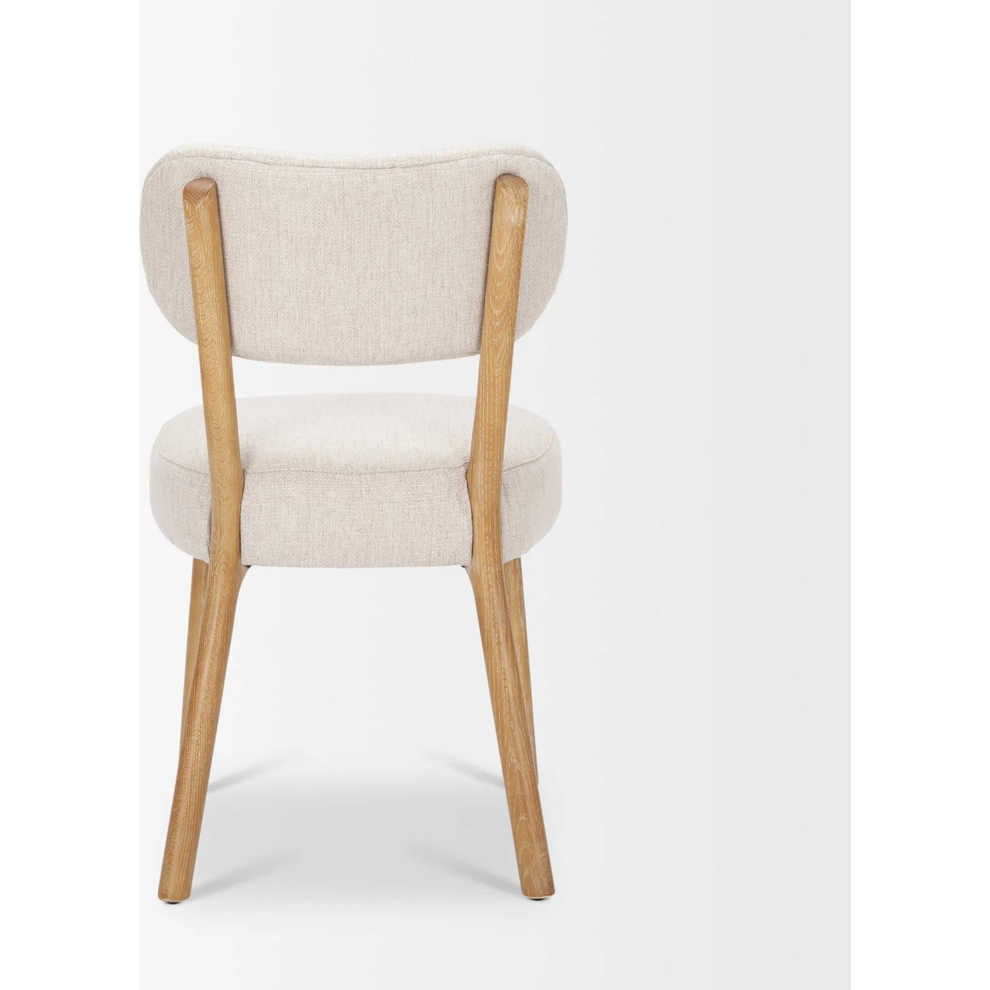 Owen Dining Chair (Set of 2) by Mercana in beige. Made from solid wood in a transitional style.
