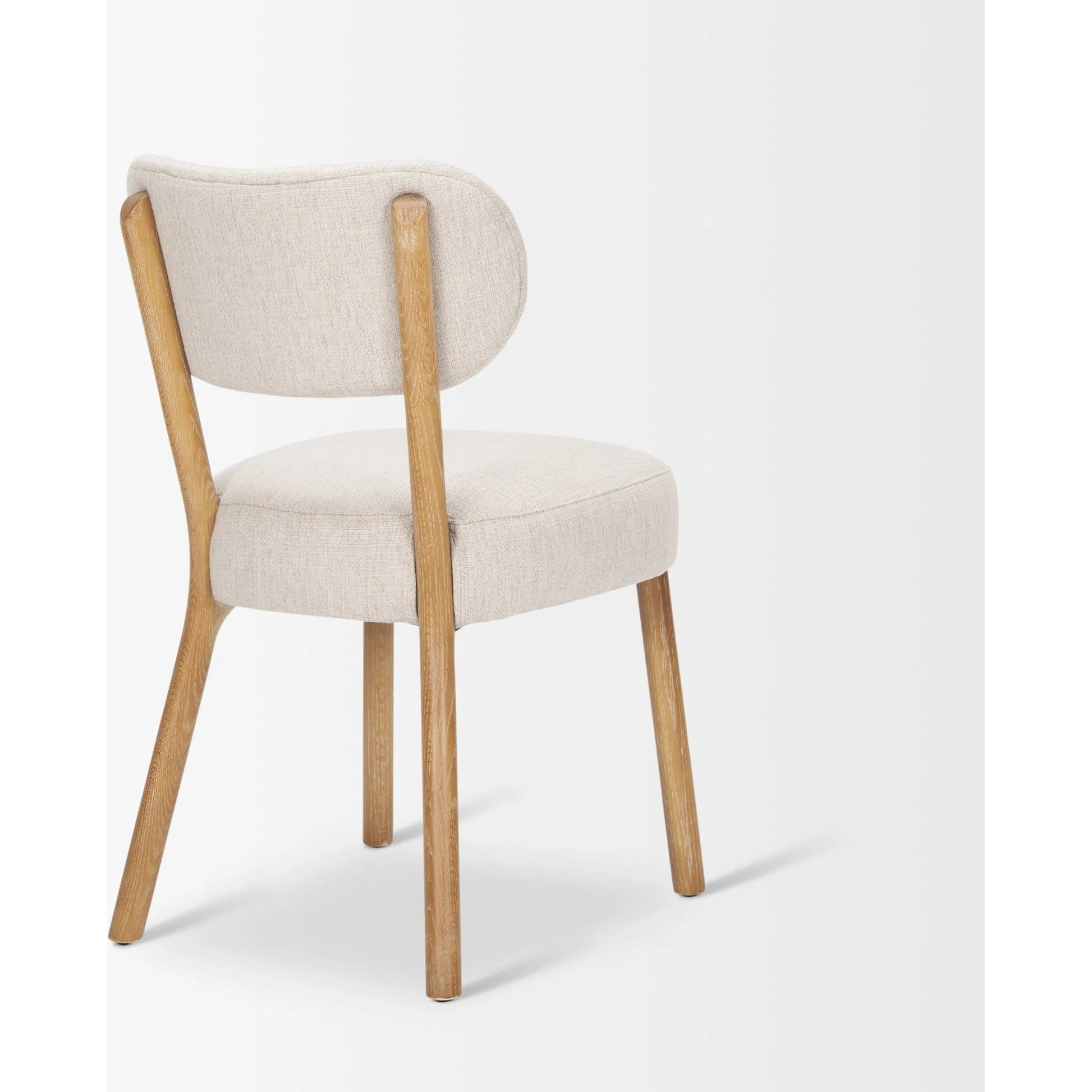 Owen Dining Chair (Set of 2) by Mercana in beige. Made from solid wood in a transitional style.