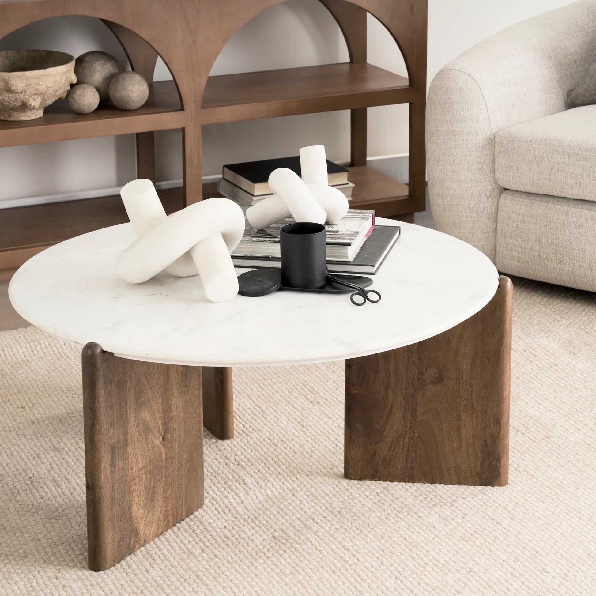 Rumer Coffee Table by Mercana in brown. Made from stone in a modern style.