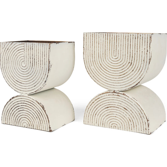 Medina Planters by Mercana. Made from metal in a rustic style.