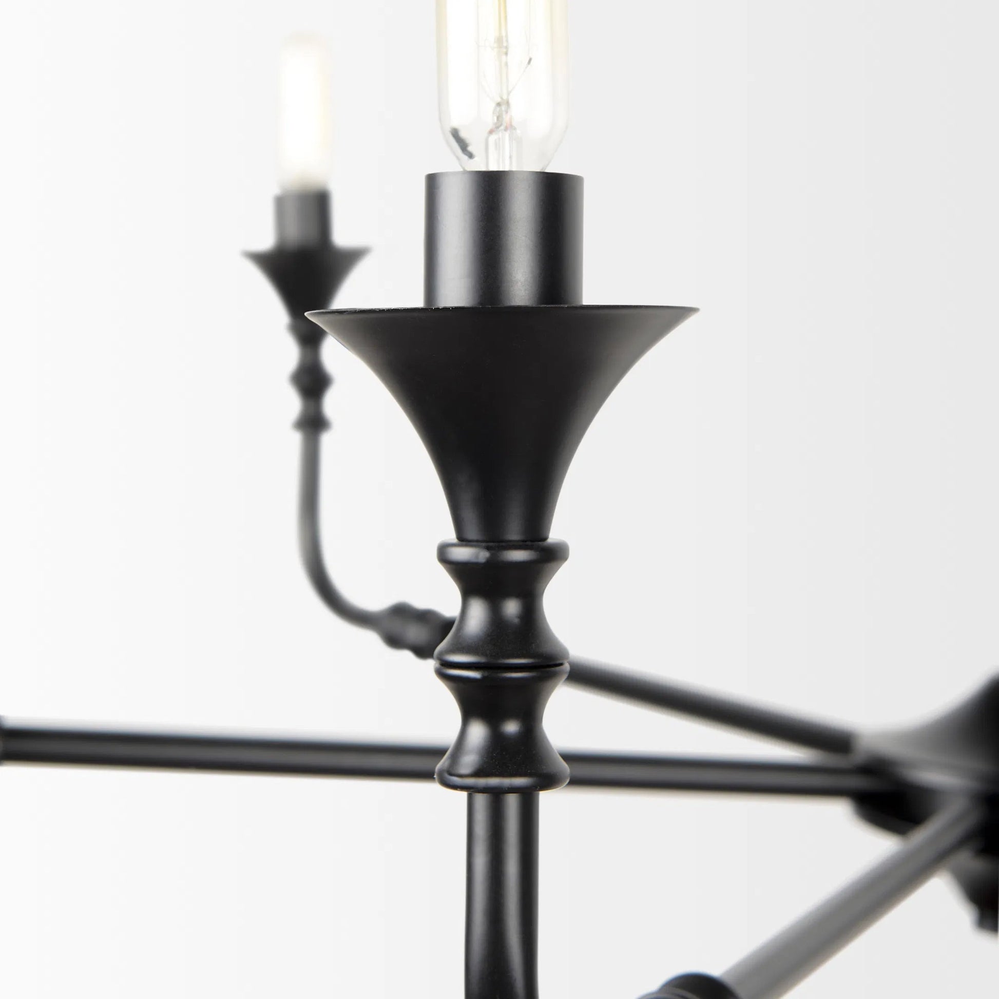 Gabriel Chandelier by Mercana in black. Made from metal in a traditional style.