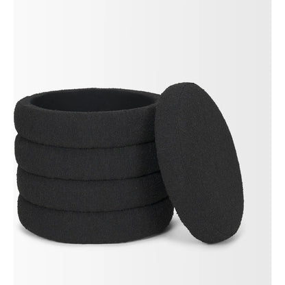 Elise Ottoman by Mercana in black. Made from fabric in a unique style.