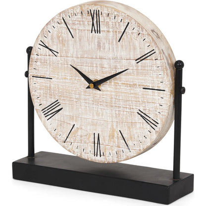 Raja Table Clock by Mercana in black, brown. Made from metal, solid wood in a cottage & farmhouse style.