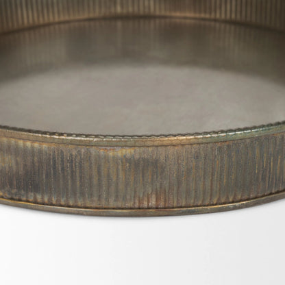 Varun Round Antiqued Brass Trays by Mercana in yellow. Made from metal in a modern style.