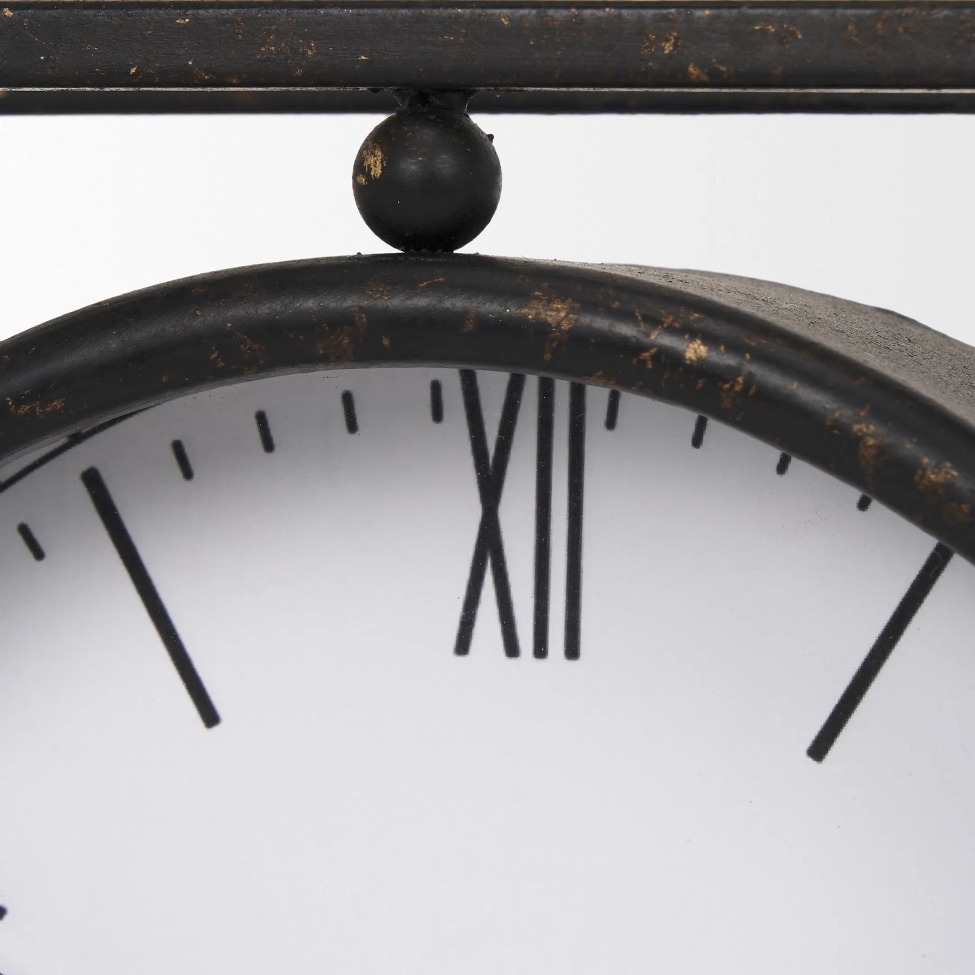 Raisa Table Clock by Mercana in black. Made from metal in a traditional style.