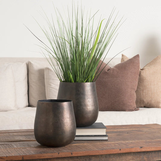 Quade Planter by Mercana in gold. Made from metal in a unique style.