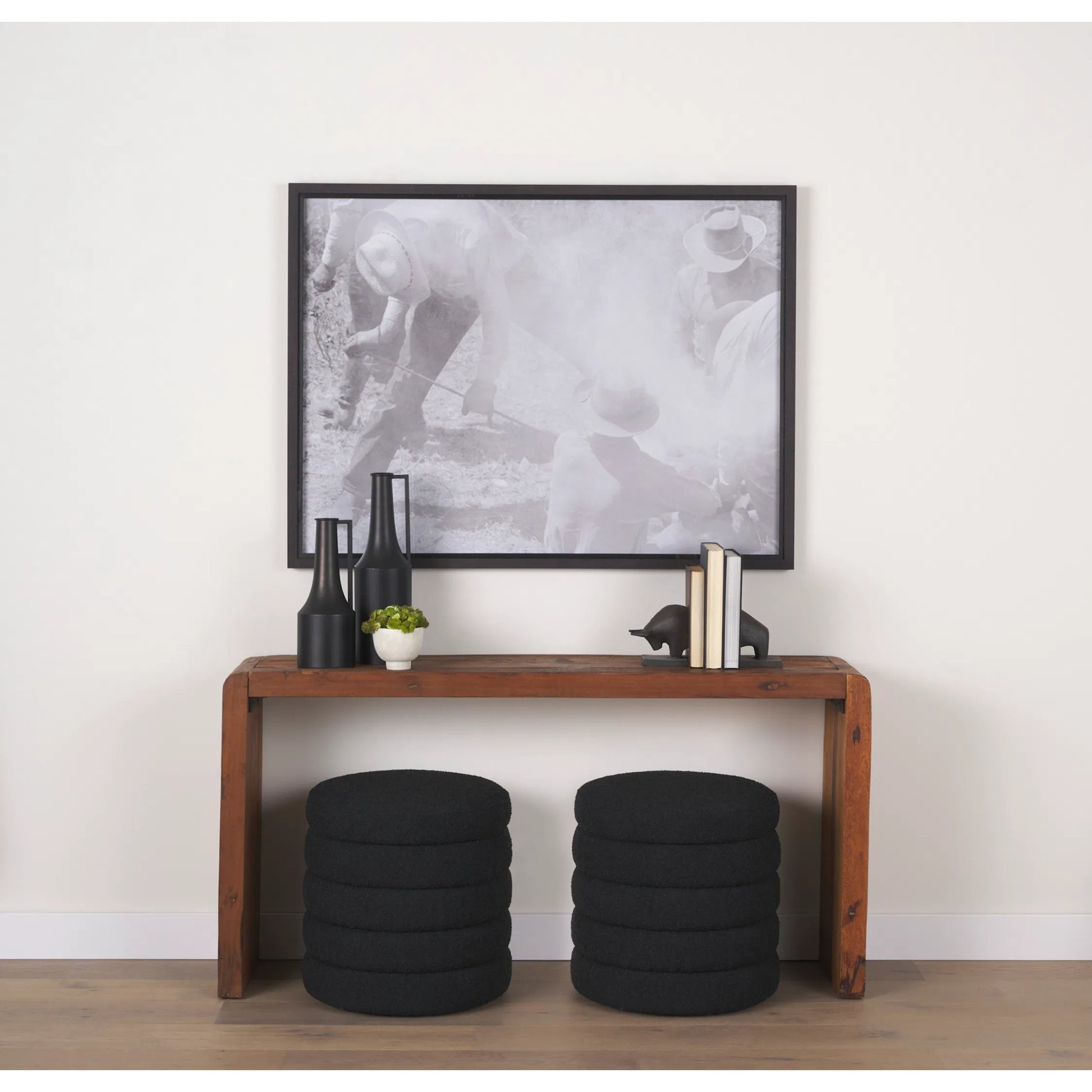 Elise Ottoman by Mercana in black. Made from fabric in a unique style.