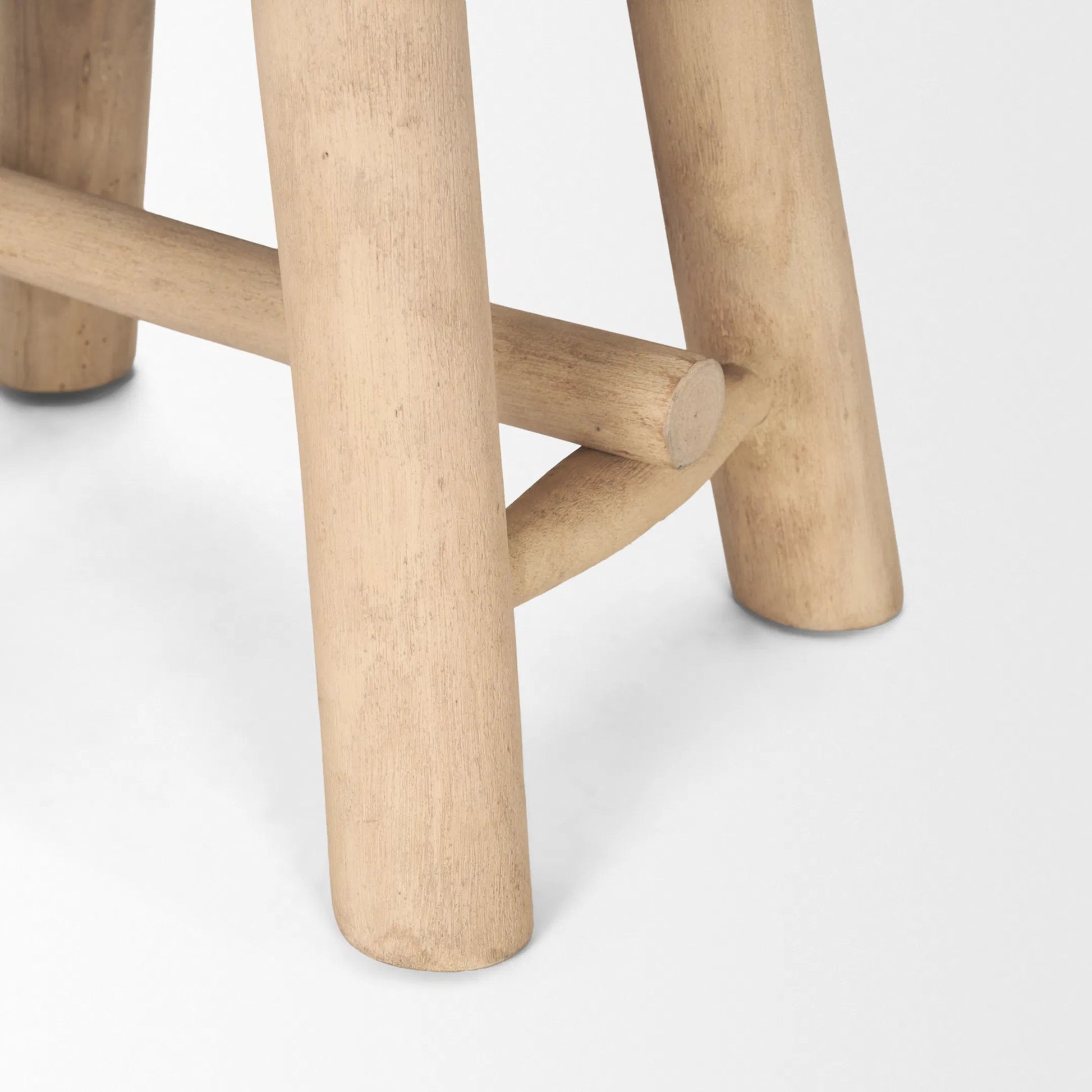 Sekou Stool by Mercana in brown. Made from solid wood in a transitional style.