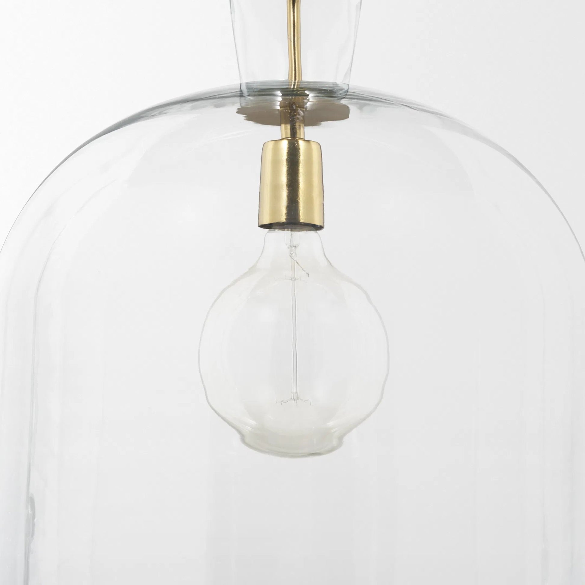 Sadah Pendant Light by Mercana in brushed brass. Made from glass in a transitional style.