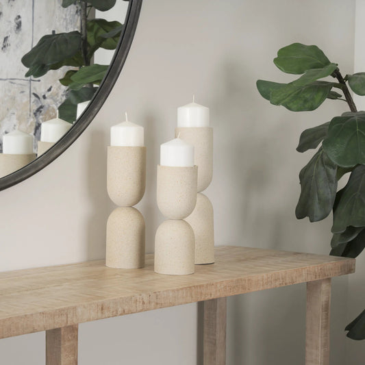 Qamra Pillar Candle Holder by Mercana. Made from metal in a modern style.