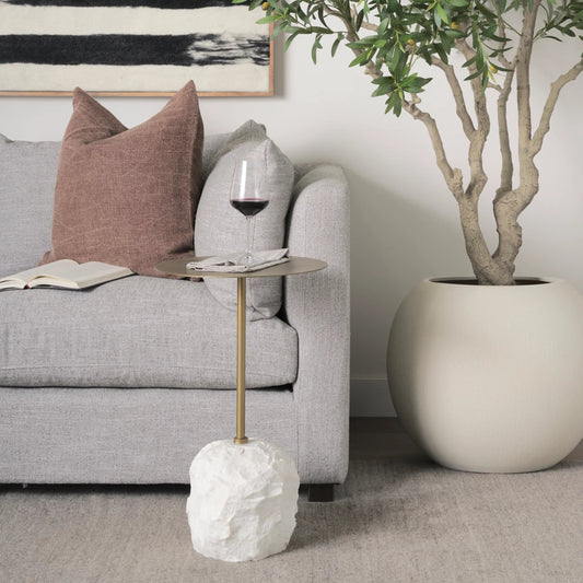 Rini Accent Table by Mercana in gold. Made from stone in a modern style.