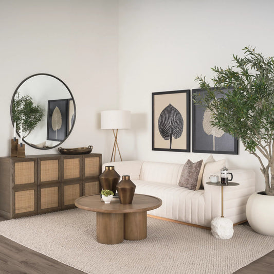 Tavi Round Coffee Table by Mercana in brown. Made from solid wood in a unique style.