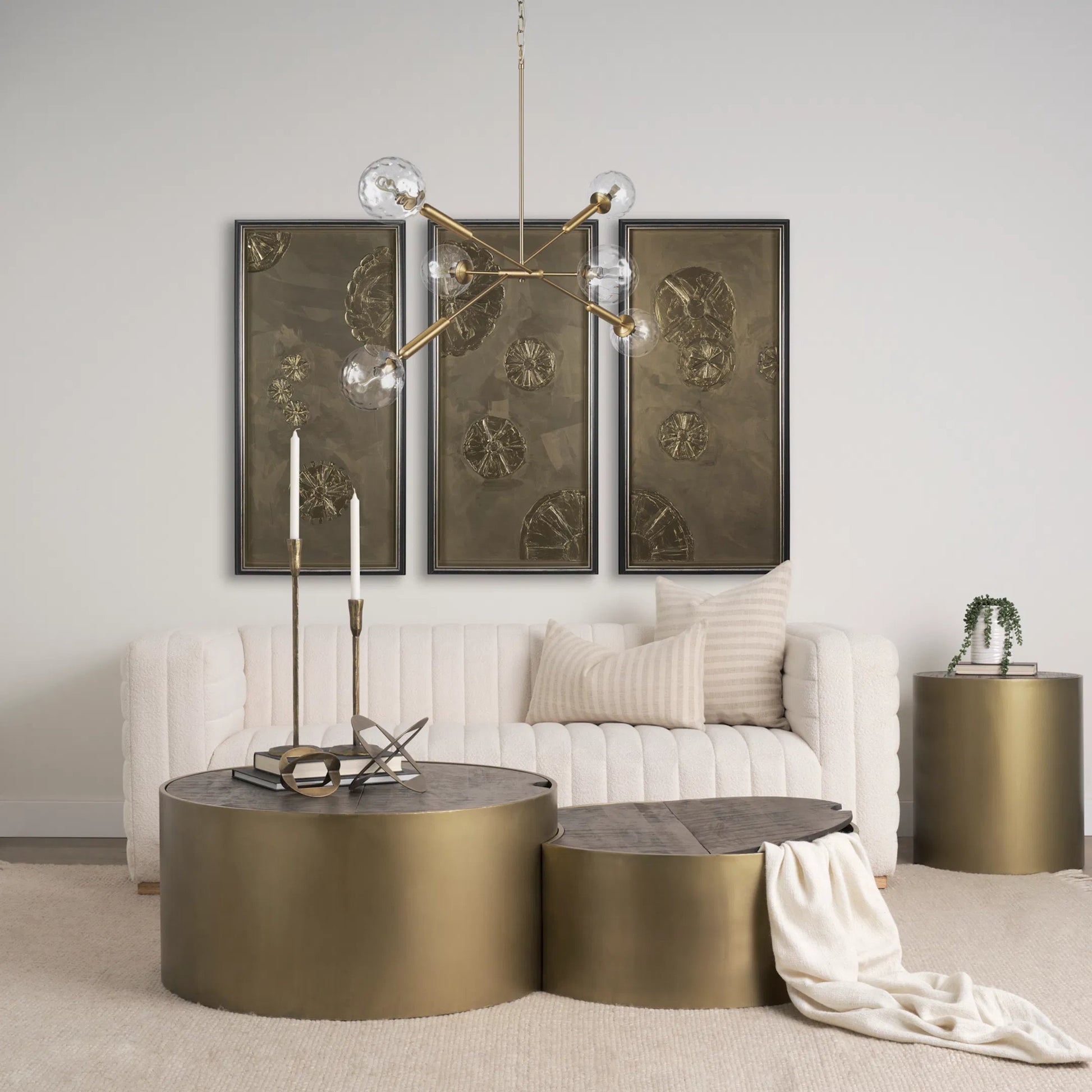 Britton Chandelier by Mercana in gold. Made from glass, metal in a modern style.
