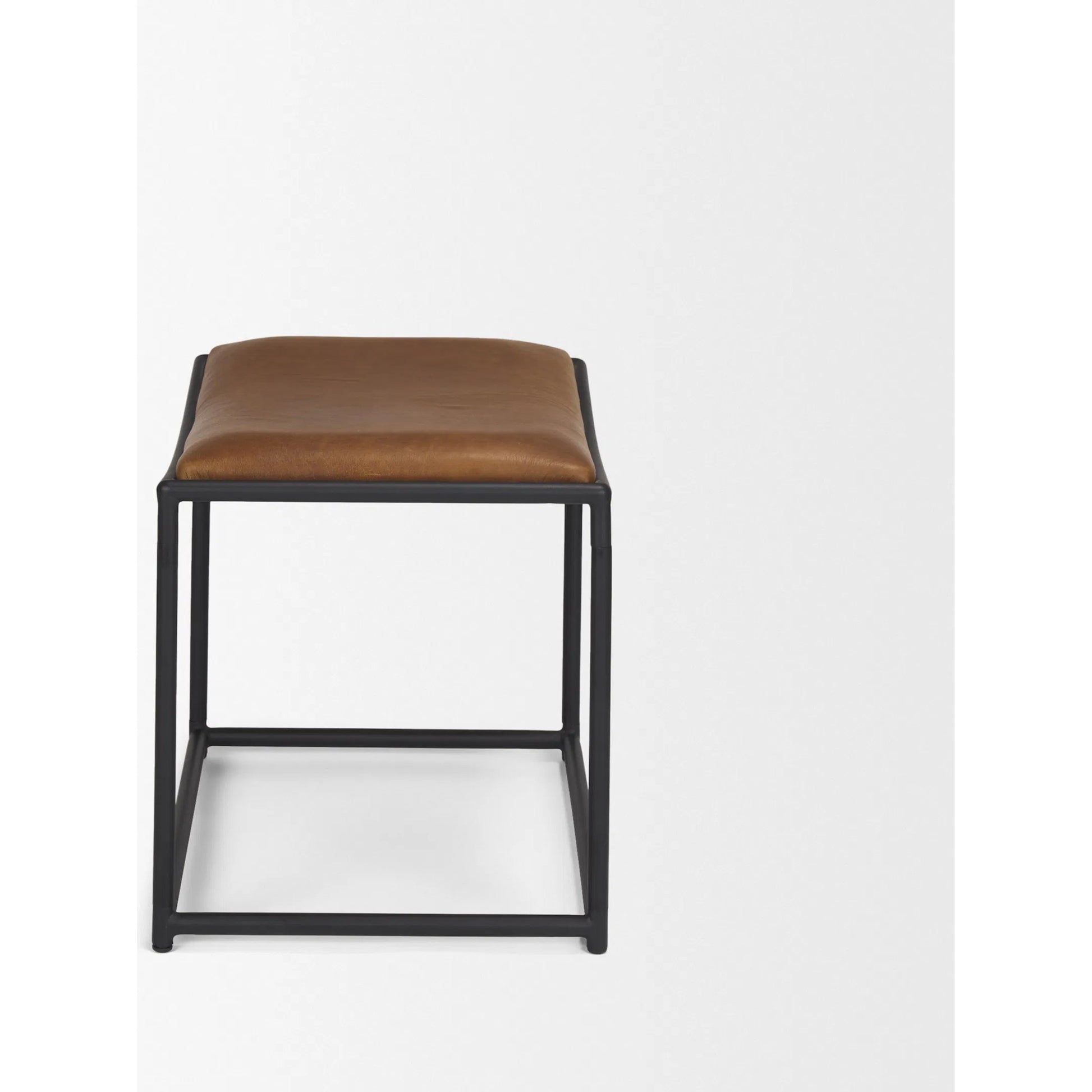 Taniel Leather Stool by Mercana. Made from leather in a traditional style.