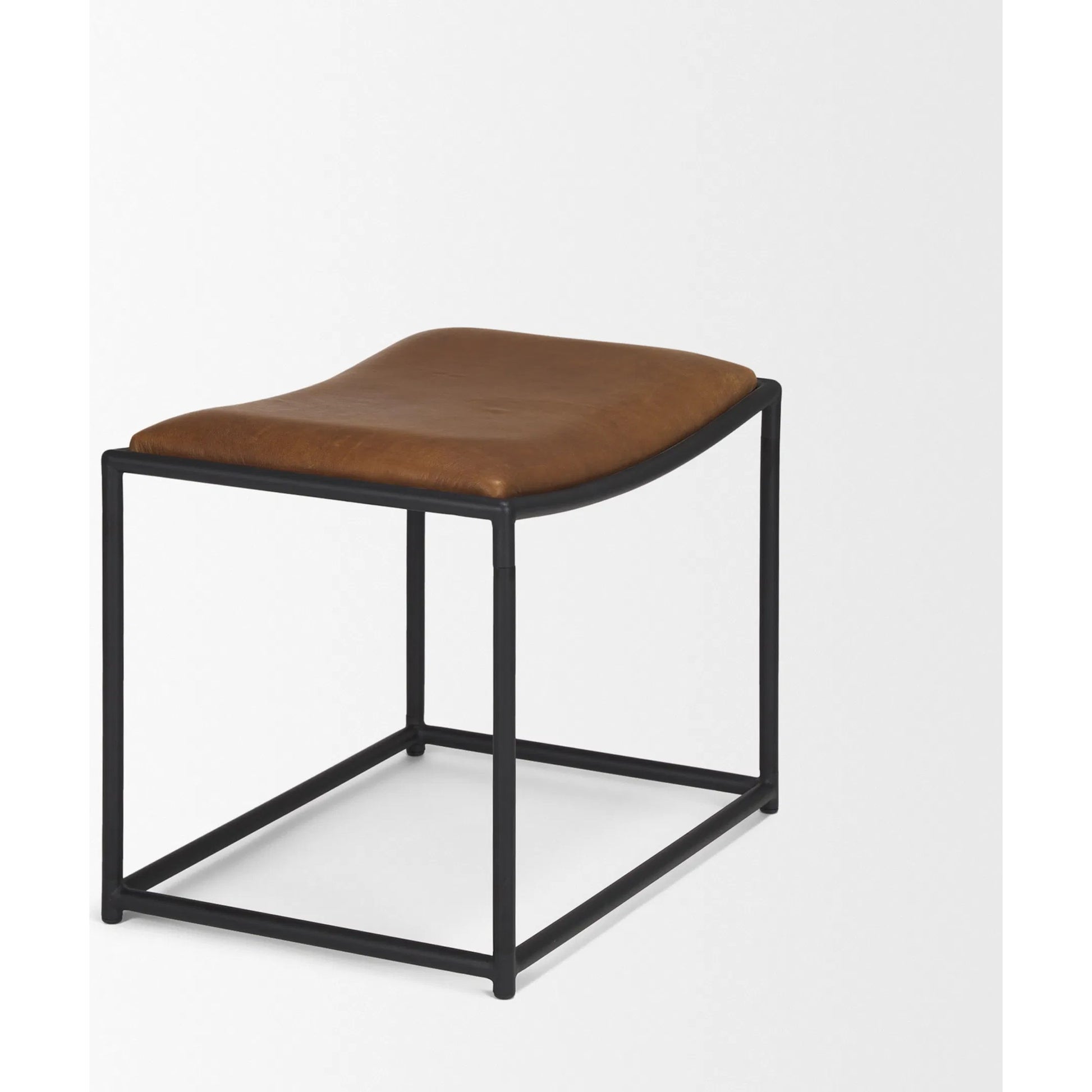 Taniel Leather Stool by Mercana. Made from leather in a traditional style.