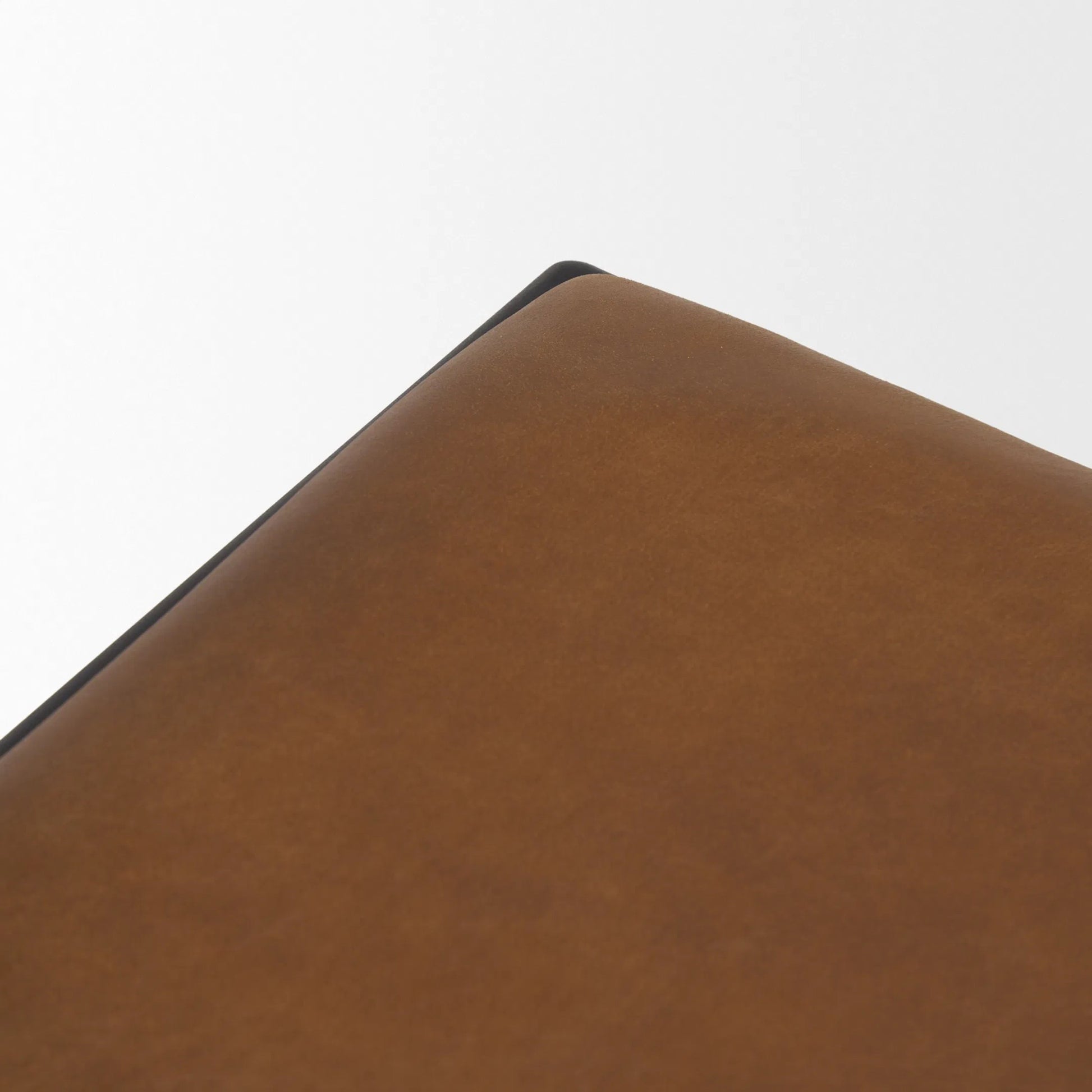 Taniel Leather Stool by Mercana. Made from leather in a traditional style.