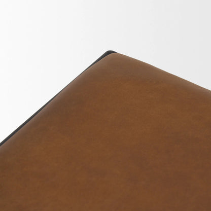 Taniel Leather Stool by Mercana. Made from leather in a traditional style.