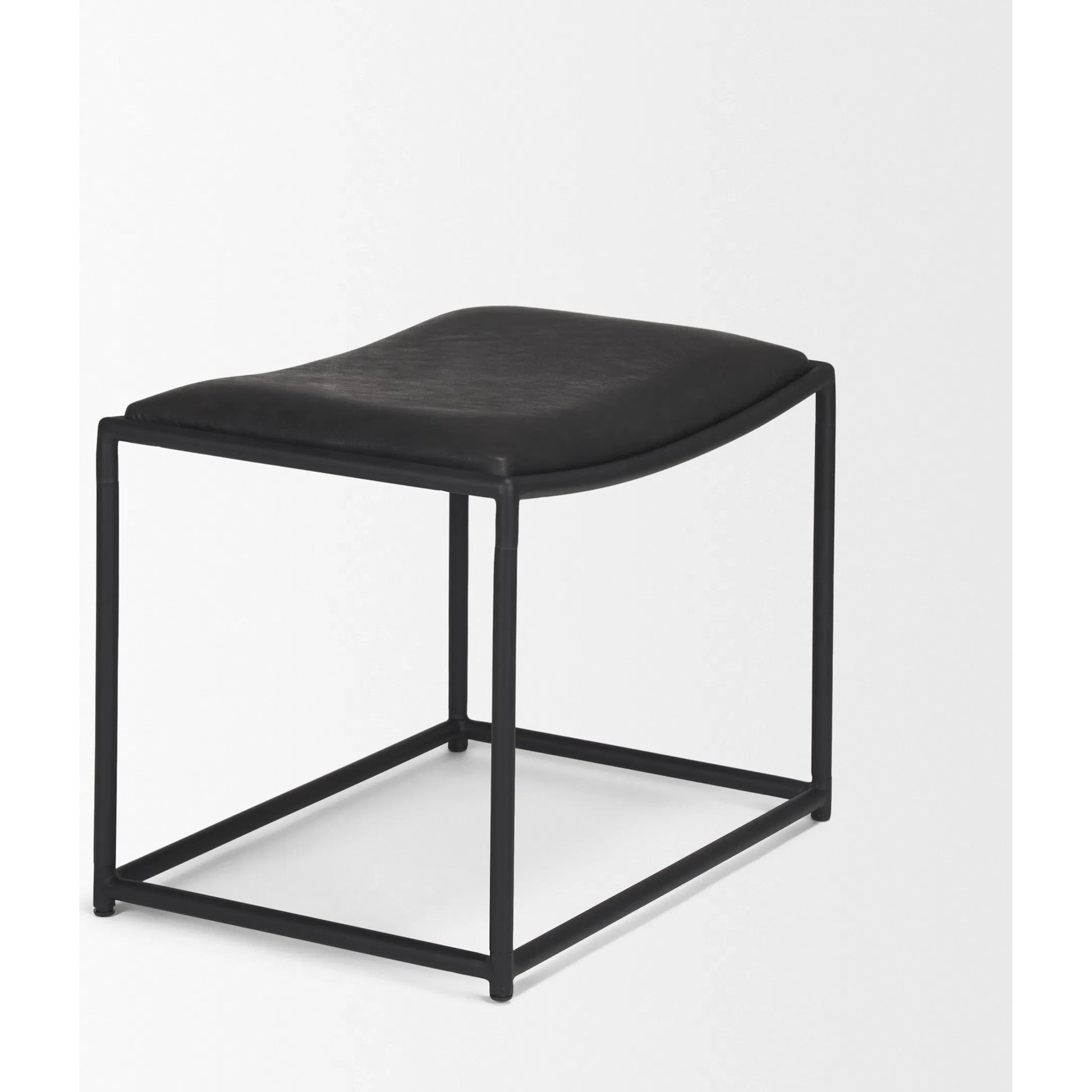 Taniel Leather Stool by Mercana. Made from leather in a traditional style.